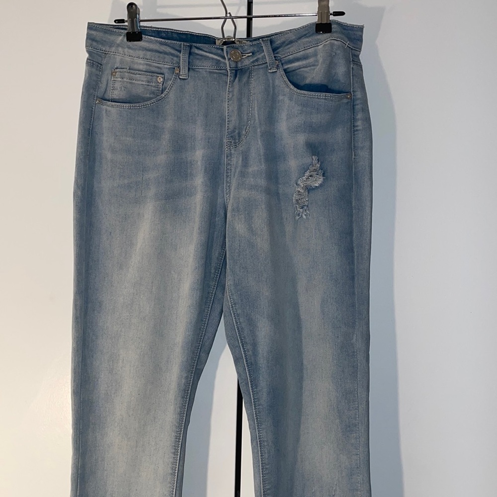 Indigo Rein (NWOT) light blue ripped skinny jeans. Size 11.